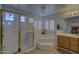 Elegant bathroom with corner soaking tub and walk-in shower at 35849 N 3Rd St, Phoenix, AZ 85086