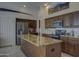 Modern kitchen with dark wood cabinets and granite counters at 35849 N 3Rd St, Phoenix, AZ 85086