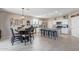 Spacious kitchen featuring an island, stainless steel appliances, and ample counter space at 36811 N El Morro Trl, San Tan Valley, AZ 85140