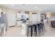 Spacious kitchen with island, stainless steel appliances, and granite countertops at 36811 N El Morro Trl, San Tan Valley, AZ 85140