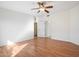 Neutral bedroom with wood floors, a ceiling fan, and bright lighting at 37222 N Tom Darlington Dr # 11, Carefree, AZ 85377