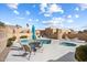 Gorgeous community pool and hot tub and lounge seating with desert views at 37222 N Tom Darlington Dr # 11, Carefree, AZ 85377