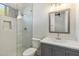 Clean bathroom, gray vanity, and glass shower at 3750 N Piedra Cir, Mesa, AZ 85207