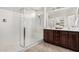 Double vanity bathroom with large walk-in shower at 3905 S 185Th Ln, Goodyear, AZ 85338