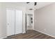 Bedroom with closet and view into another room at 3905 S 185Th Ln, Goodyear, AZ 85338