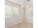 Bright dining room featuring tile floors and window blinds at 3905 S 185Th Ln, Goodyear, AZ 85338