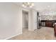 Simple dining area with tiled floors and chandelier at 3905 S 185Th Ln, Goodyear, AZ 85338