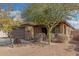 House exterior with a brown garage door and stone accents at 3905 S 185Th Ln, Goodyear, AZ 85338