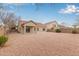 Large backyard with gravel and a covered patio at 4170 E Winged Foot Pl, Chandler, AZ 85249