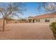 Spacious backyard with gravel and covered patio at 4170 E Winged Foot Pl, Chandler, AZ 85249