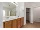 Bathroom with double vanity and large mirror at 4170 E Winged Foot Pl, Chandler, AZ 85249