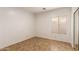 Well-lit bedroom with ceiling fan and tile floors at 4170 E Winged Foot Pl, Chandler, AZ 85249