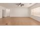 Bright living room with tile floors and a ceiling fan at 4170 E Winged Foot Pl, Chandler, AZ 85249