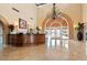 Community building reception area with a large chandelier at 4200 N Miller Rd # 526, Scottsdale, AZ 85251