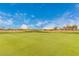 Expansive green golf course at 42276 W Chisholm Dr, Maricopa, AZ 85138