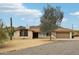 Charming home with desert landscaping, stone accents, and attached garage in a quiet neighborhood at 43006 N 3Rd Ave, New River, AZ 85087