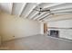 Spacious living room featuring tile flooring, a fireplace, and high vaulted ceilings at 43006 N 3Rd Ave, New River, AZ 85087