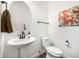 Simple yet elegant bathroom with pedestal sink and modern fixtures at 4368 E Estrella Ct, Gilbert, AZ 85296