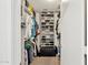 Large walk-in closet with ample shelving and hanging space for clothes and shoes at 4376 E Anderson Dr, Phoenix, AZ 85032