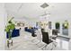 Open dining area with marble floors and modern decor at 4376 E Anderson Dr, Phoenix, AZ 85032