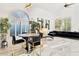 Elegant dining area with marble floors and modern gold accents at 4376 E Anderson Dr, Phoenix, AZ 85032