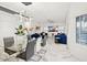 Open dining area with marble floors and modern decor at 4376 E Anderson Dr, Phoenix, AZ 85032