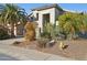 Two-story house with a two-car garage and xeriscaping at 4376 E Anderson Dr, Phoenix, AZ 85032