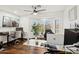 Spacious home office with ample workspace and natural light from a bay window at 4376 E Anderson Dr, Phoenix, AZ 85032