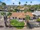 Single-story home with landscaped yard and mountain views at 4501 E Paradise Ln, Phoenix, AZ 85032