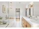 Elegant bathroom with double vanity, soaking tub, and walk-in shower at 4501 E Paradise Ln, Phoenix, AZ 85032