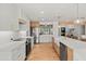 Bright kitchen with stainless steel appliances and wood cabinets at 4501 E Paradise Ln, Phoenix, AZ 85032