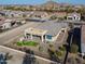 Single-story home with a large backyard and outdoor kitchen at 4557 W Agave Ave, Eloy, AZ 85131