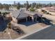 Single-story home with a two car garage and nicely landscaped yard at 4557 W Agave Ave, Eloy, AZ 85131