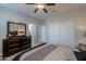 Main bedroom with dresser and large closet with sliding doors at 4557 W Agave Ave, Eloy, AZ 85131