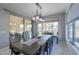 Dining room with sliding glass doors to patio at 4557 W Agave Ave, Eloy, AZ 85131