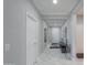 View of entry hall with tile flooring, a mirror, and neutral walls at 4557 W Agave Ave, Eloy, AZ 85131