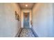 Entryway with decorative rug and metal security door at 4557 W Agave Ave, Eloy, AZ 85131