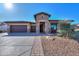 House exterior, showing a front view with a brick walkway and landscaping at 4557 W Agave Ave, Eloy, AZ 85131