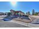 Single story home with desert landscaping and a two car garage at 4557 W Agave Ave, Eloy, AZ 85131