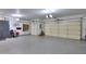 Spacious garage with ample storage and overhead storage at 4557 W Agave Ave, Eloy, AZ 85131