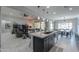 Modern kitchen with a large island and views of the Gathering room at 4557 W Agave Ave, Eloy, AZ 85131