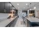 Modern kitchen with dark cabinets, granite countertops and breakfast bar at 4557 W Agave Ave, Eloy, AZ 85131