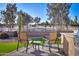 Relaxing patio seating area with chairs and small table at 4557 W Agave Ave, Eloy, AZ 85131