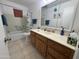 Bathroom with tub, vanity, and decorative accents at 4624 E Emerald Ave, Mesa, AZ 85206