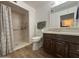 Well-appointed bathroom featuring a walk-in shower and updated vanity at 4624 E Emerald Ave, Mesa, AZ 85206