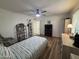 Bedroom with twin bed, dresser, and ceiling fan at 4624 E Emerald Ave, Mesa, AZ 85206