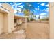 Backyard with covered patio and view of house at 4809 W Sandra Ter, Glendale, AZ 85306