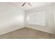 Simple bedroom with neutral carpeting and window blinds at 4809 W Sandra Ter, Glendale, AZ 85306