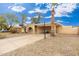 House exterior showcasing a driveway and desert landscaping at 4809 W Sandra Ter, Glendale, AZ 85306