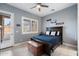 Bedroom with mountain views and dark wood bed frame at 5063 E Reavis St, Apache Junction, AZ 85119